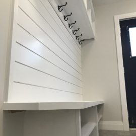 Whitfield Home Improvements: custom bench and storage cabinet for this mud room