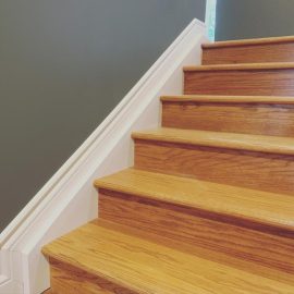 Whitfield Home Improvements: custom baseboard and stair trim
