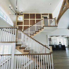 Whitfield Home Improvements: custom millwork on these wood wall panels, baseboards and window trim