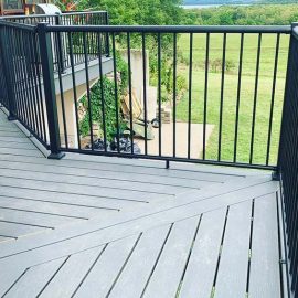 Whitfield Home Improvements: second story walk out deck renovation with composite decking and metal railing
