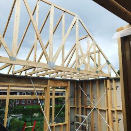 Whitfield Home Improvements - new addition roof trusses being erected