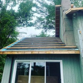 Whitfield Home Improvements - home renovation - strapping for new new steel roof and trim