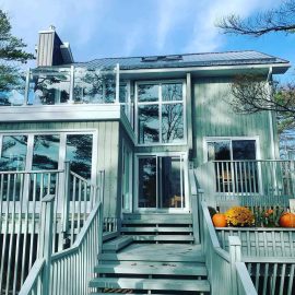 Whitfield Home Improvements - home renovation completed - new steel roof, trim, deck railing and repairs