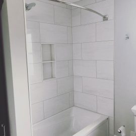 Whitfield Home Improvements: bathroom reno, new tiled tub enclosure