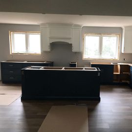 Kitchen cupboard and island installation by Whitfield Home Improvements.