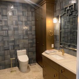 Whitfield Home Improvements: beautiful tile bathroom with dark wook cabinets, renovation complete