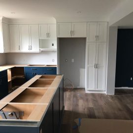 Kitchen cupboard and island installation by Whitfield Home Improvements.